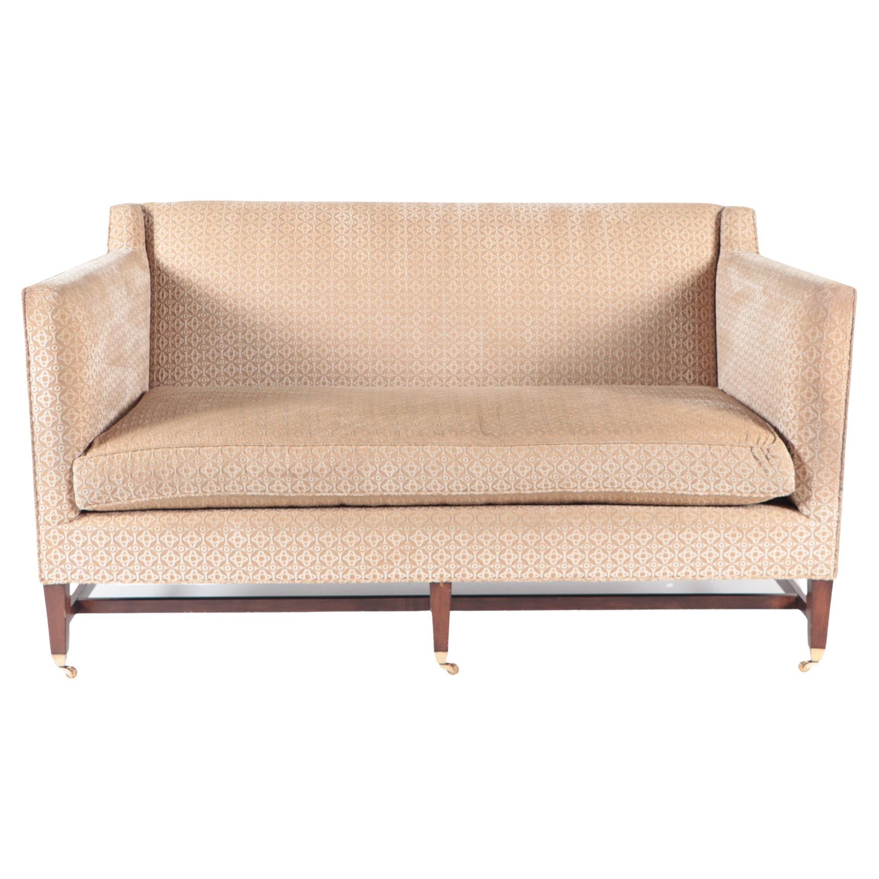 A Mid Century Modern style Edward Ferrell two seat upholstered sofa, late 20th C For Sale