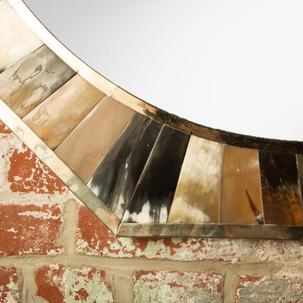 A contemporary eight sided horn mirror, in the manner of Karl Springer.
 