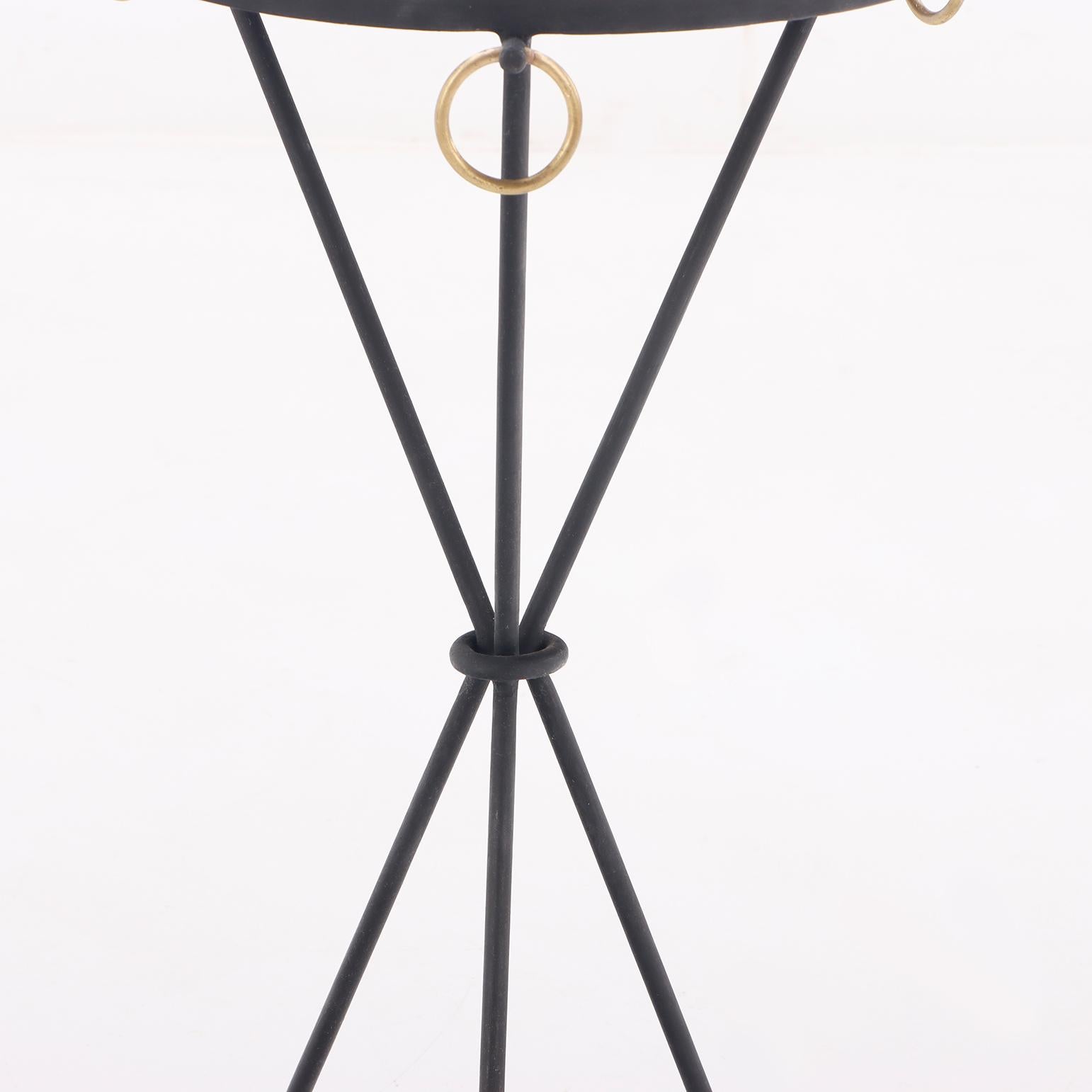 Contemporary A contemporary pair of wrought iron drink tables having ring decoration.  For Sale