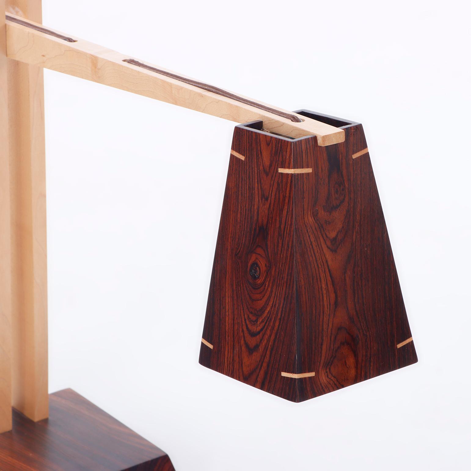 Bronze A contemporary studio made rosewood table lamp. For Sale