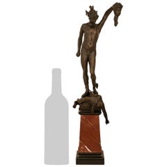 A Continental 19th century Bronze and Marble statue of Perseus and Medusa