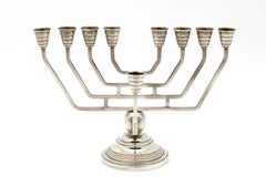 A Continental Art Deco Silver Hanukkah Menorah, 20th Century