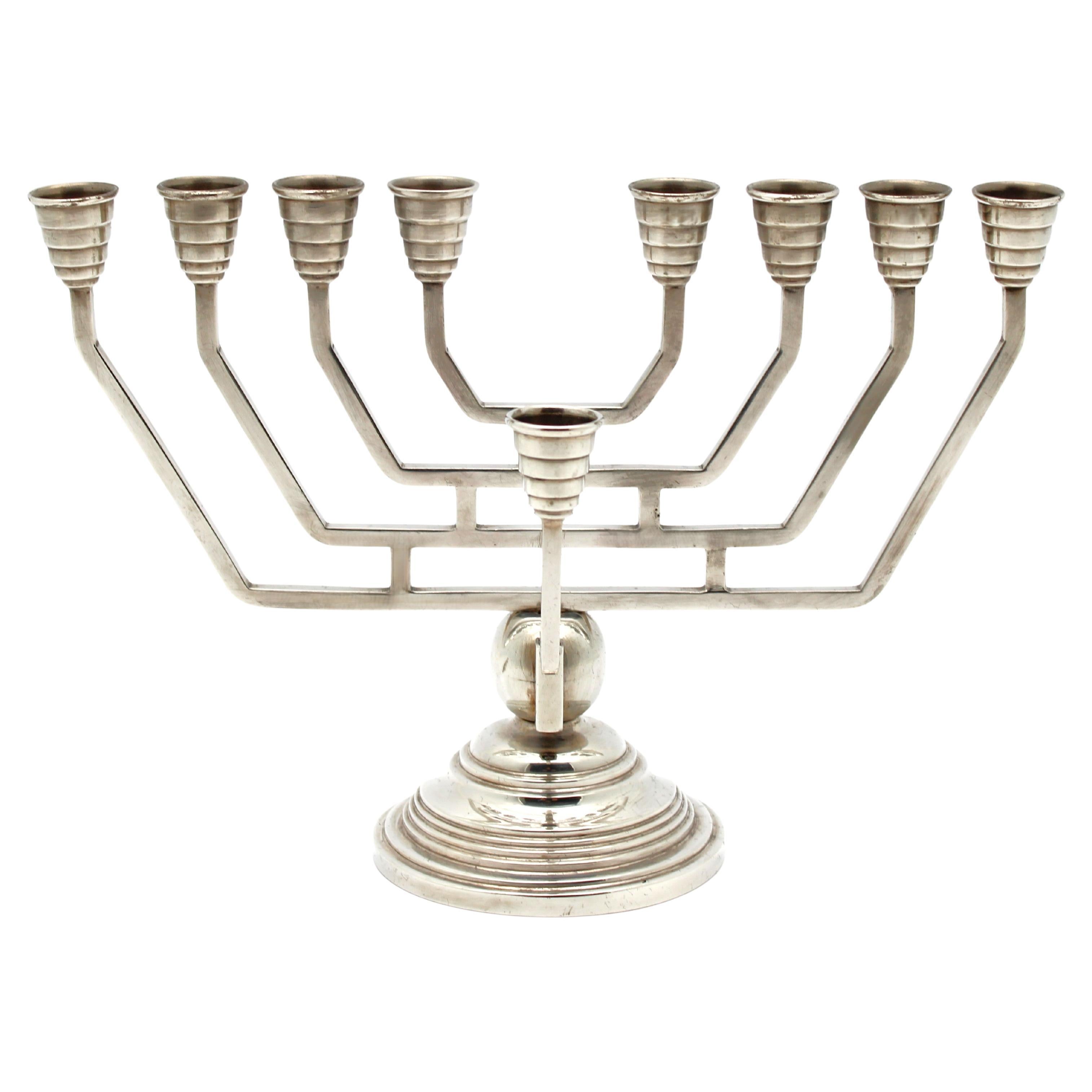 A Continental Art Deco Silver Hanukkah Menorah, 20th Century