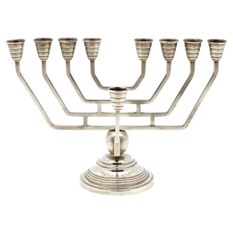 A Continental Art Deco Silver Hanukkah Menorah, 20th Century