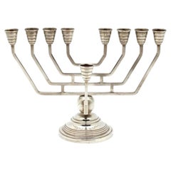 A Continental Art Deco Silver Hanukkah Menorah, 20th Century