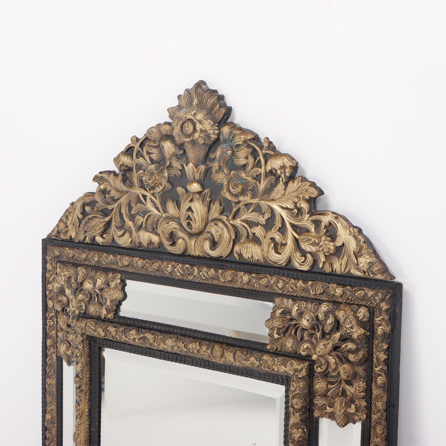 French A continental brass repouse cushion mirror circa 1890.