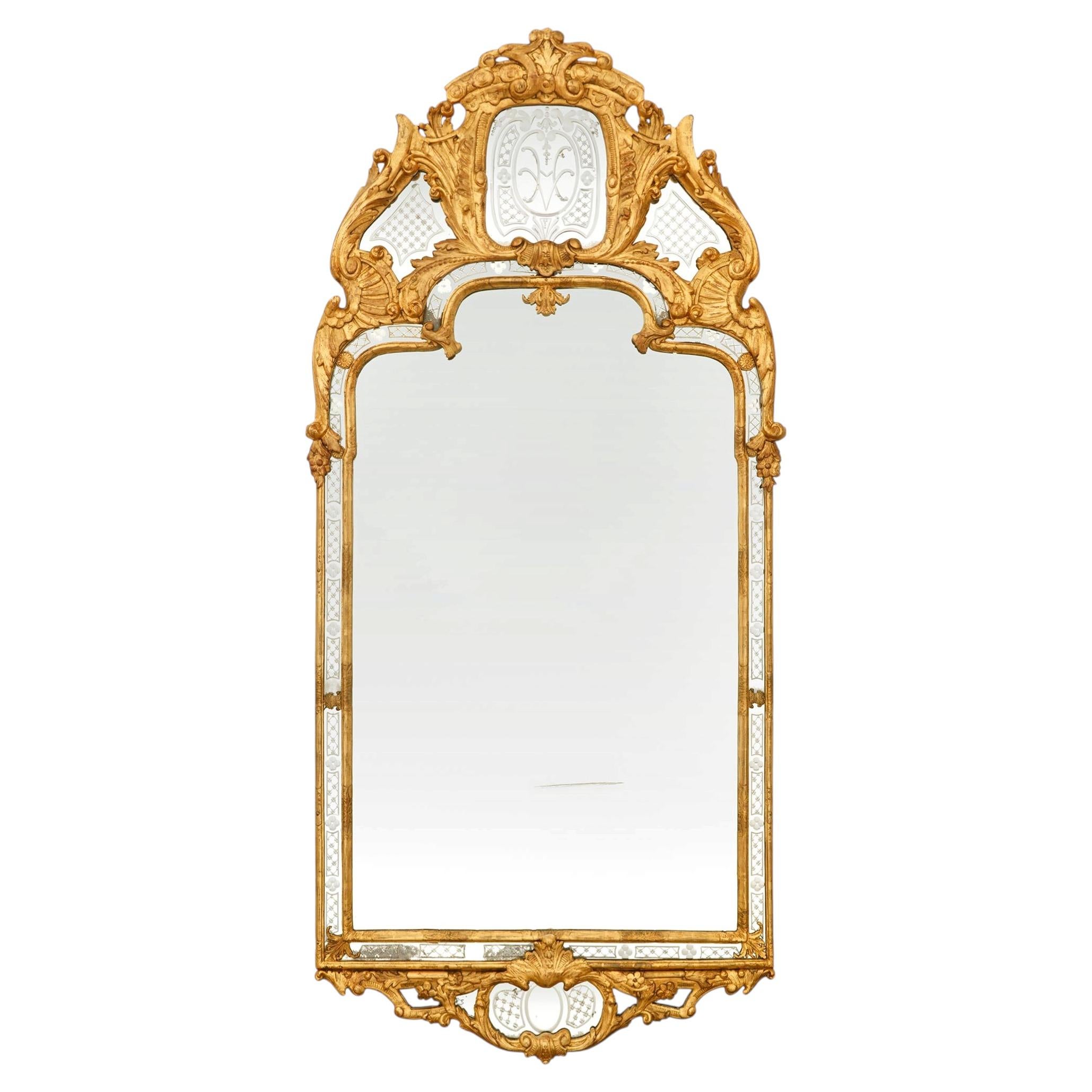 A Continental late 18th century Louis XV Period Giltwood mirror For Sale