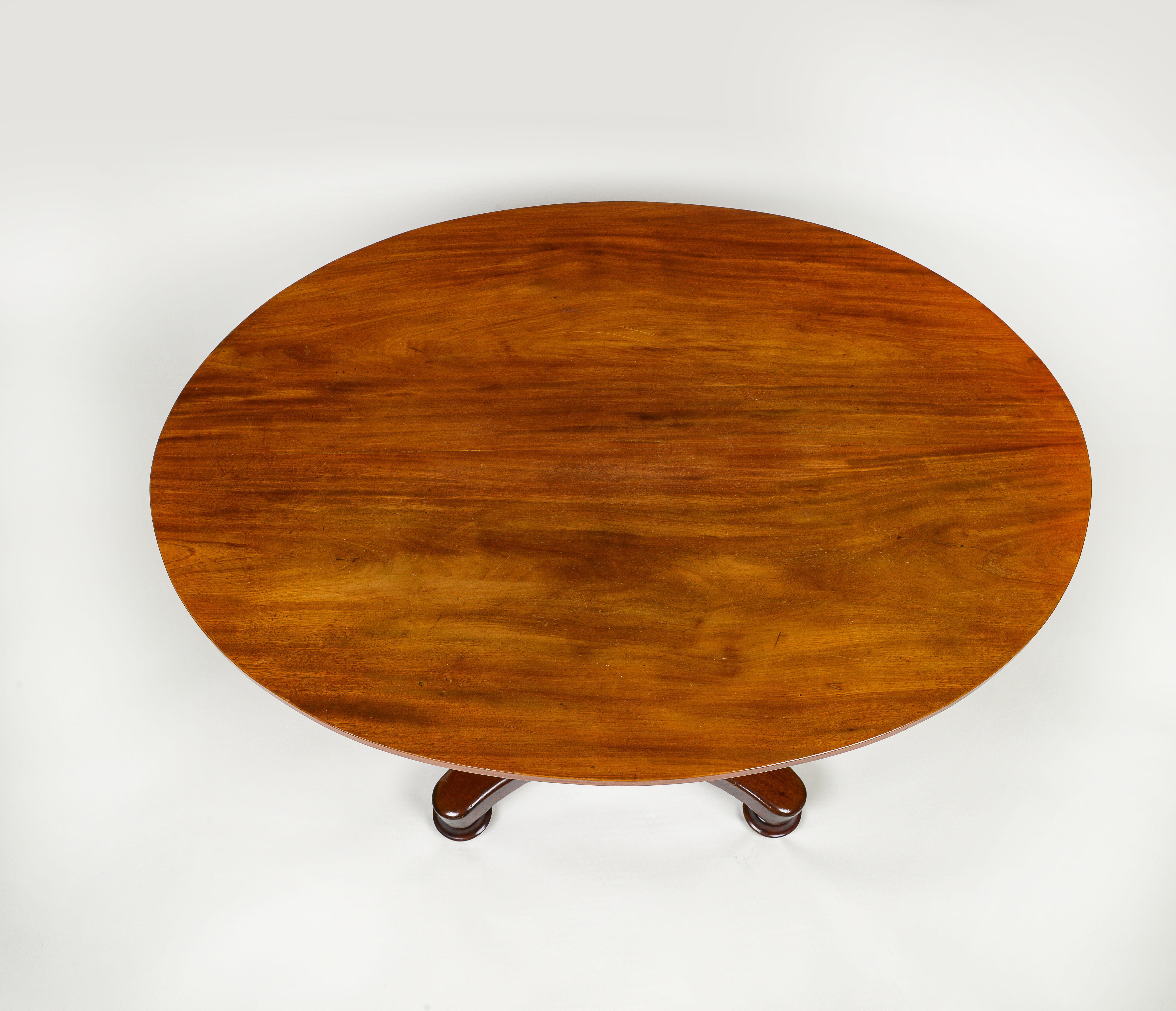 Mid-19th Century A Continental Mahogany Oval Center Table For Sale