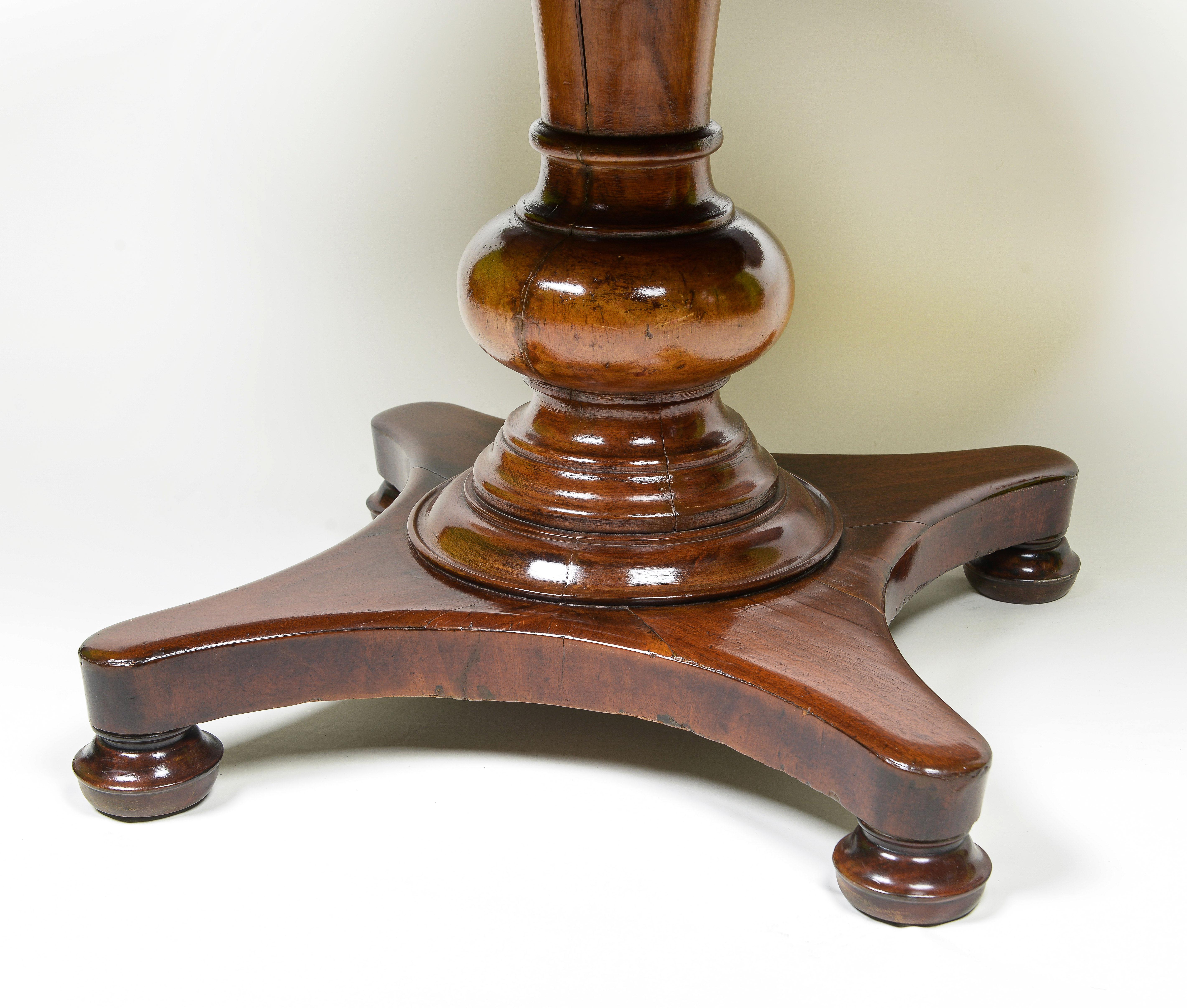 A Continental Mahogany Oval Center Table For Sale 1