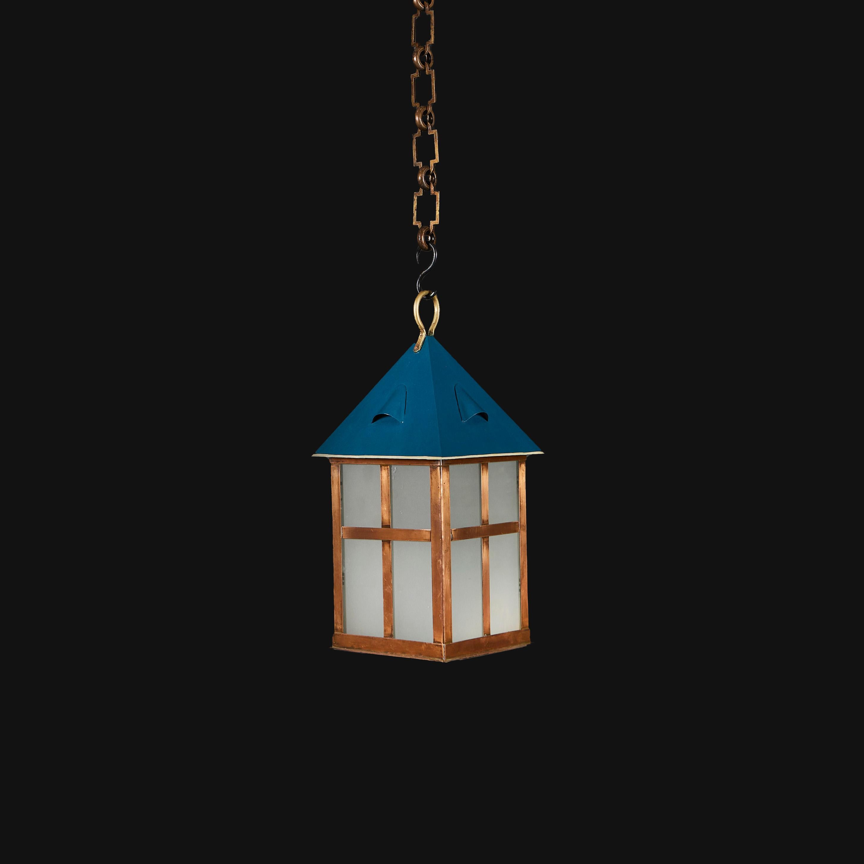 England, circa 1910

A copper Arts and Crafts Hanging Lantern with frosted glass panels and blue painted canopy. 

Height 40.00cm

Width 18.00cm

Depth 18.00cm