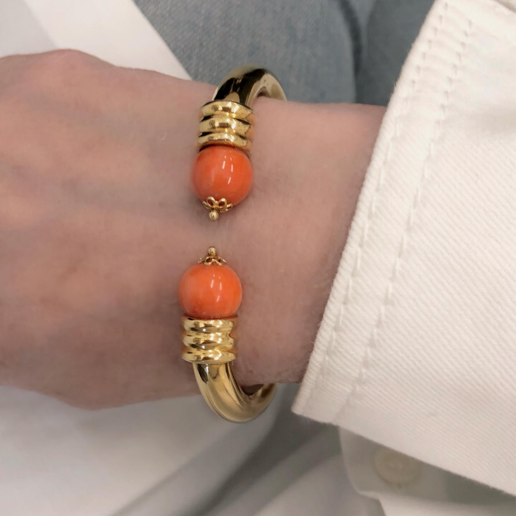 coral bangles in gold