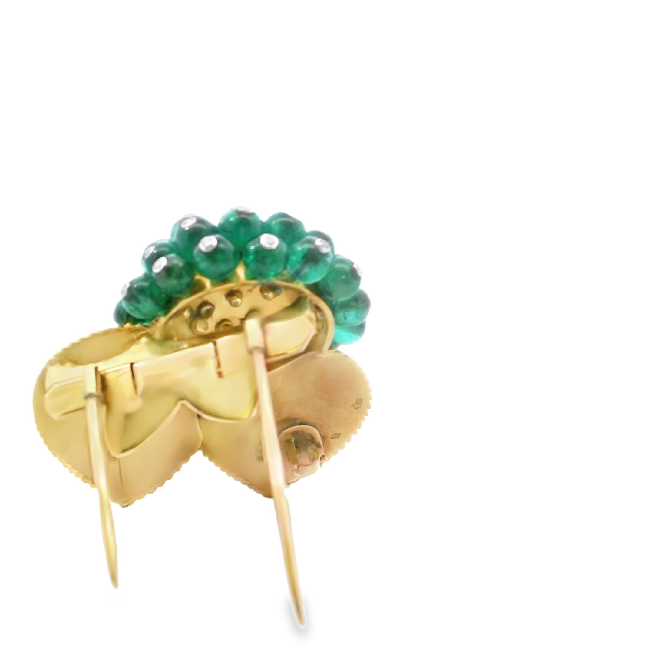 Rare Suzanne Belperron “Groseilliers” Corsage Clip  Circa 1937-1942

This exceptional corsage clip by Suzanne Belperron, titled “Groseilliers” (Gooseberries), is a stunning example of her revolutionary approach to jewelry design. Created between