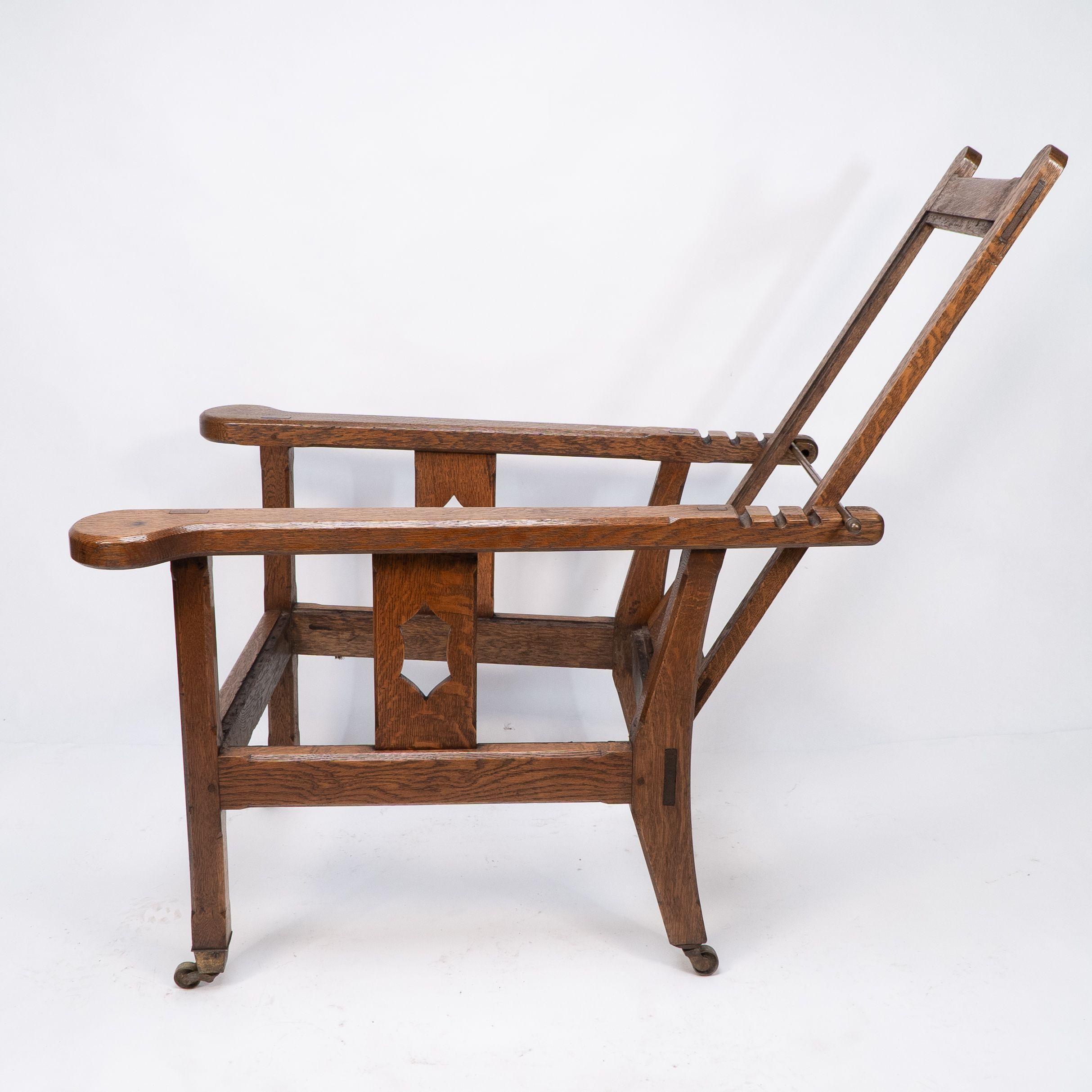 Oak A Cotswold School Arts and Crafts reclining oak armchair of superior quality For Sale