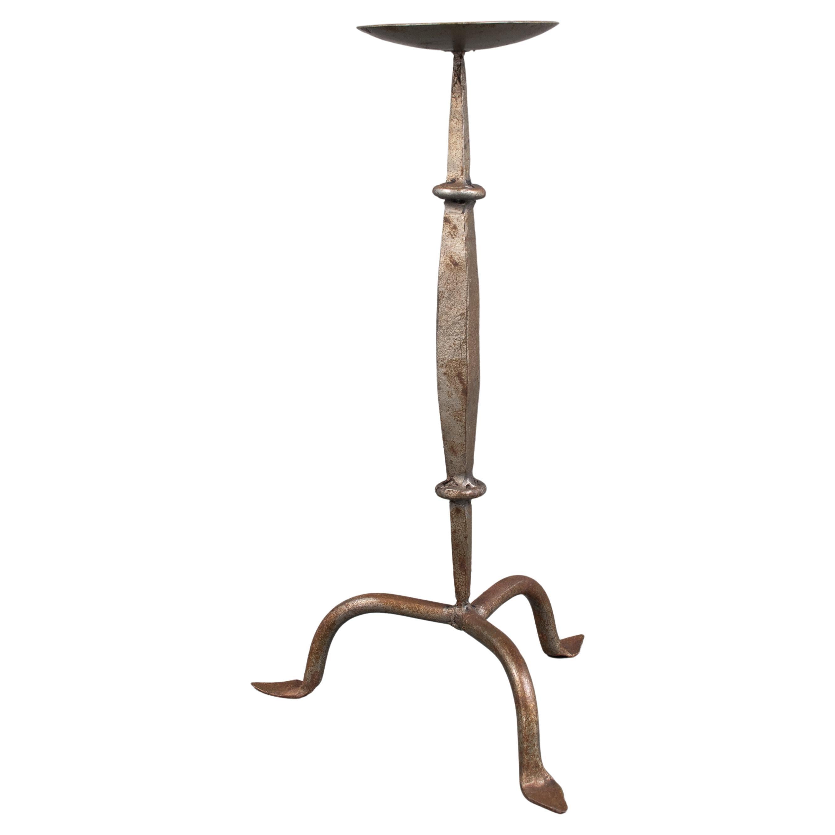 A Cotswold School Arts & Crafts hand wrought iron pricket candlestick