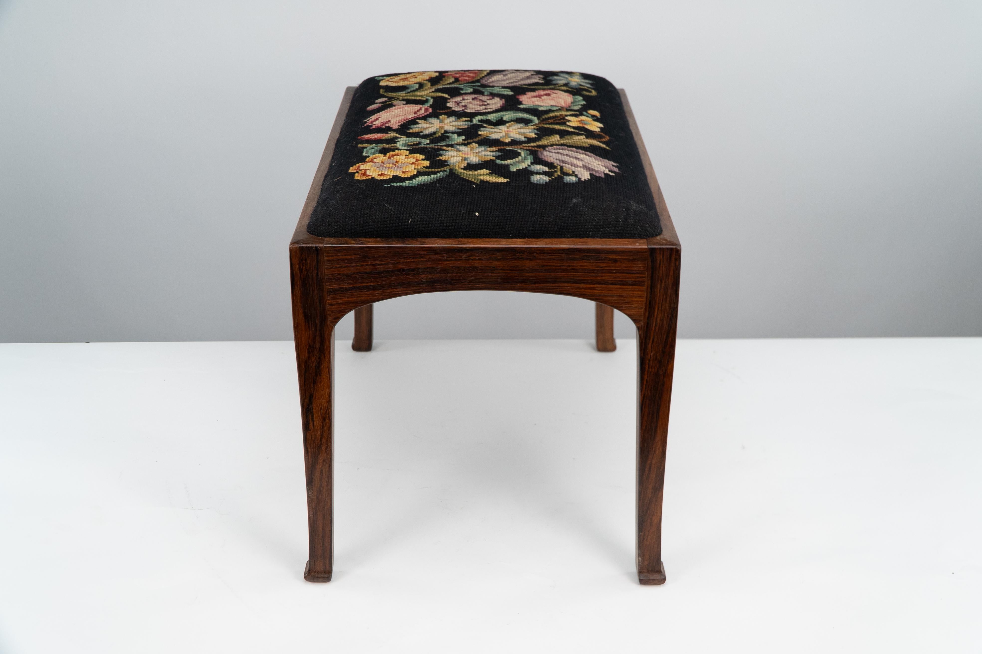 English Edward Barnsley. A Cotswold School walnut stool with the original tapestry seat. For Sale