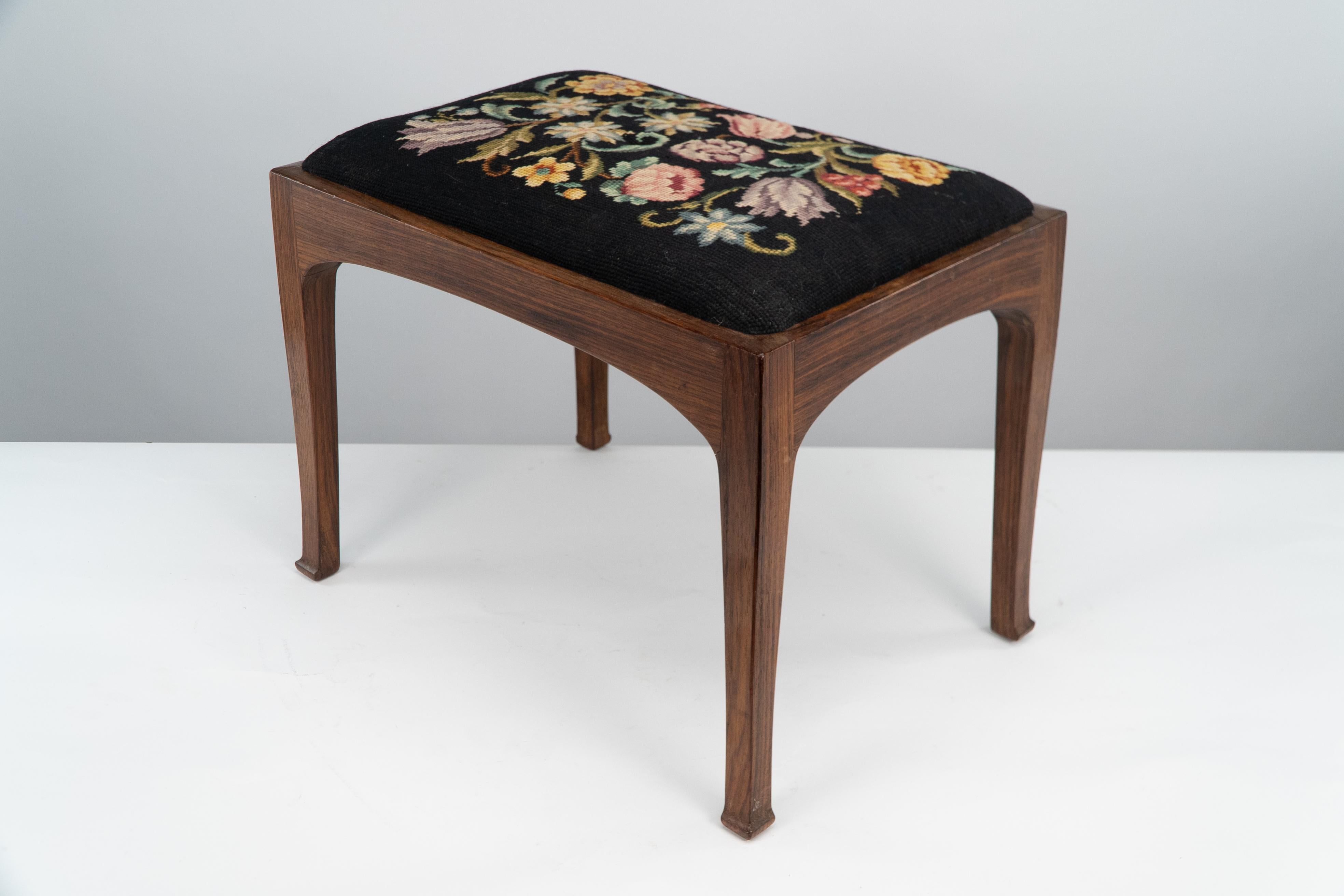 Early 20th Century Edward Barnsley. A Cotswold School walnut stool with the original tapestry seat. For Sale