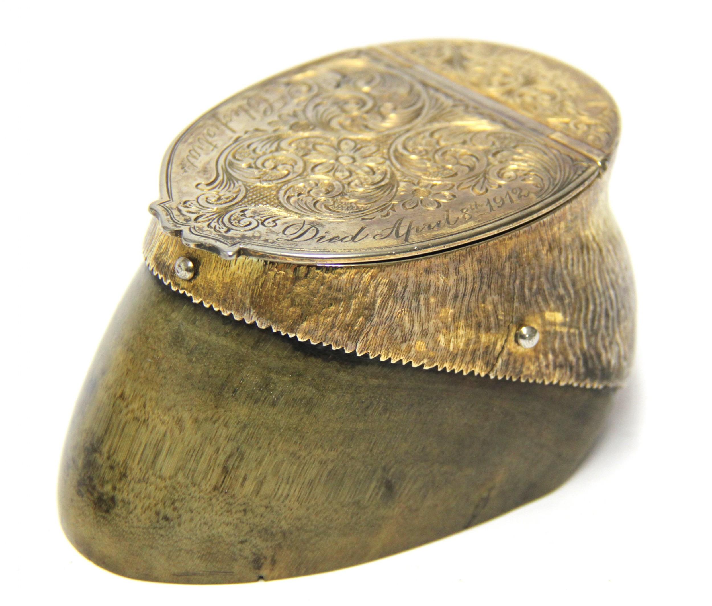 This rather quirky item was made from the hoof of a deer from the County estate in Herefordshire of Stoke Edith.
It has been fully mounted and turned into a desk inkwell with gilt brass mounts and a hinged lid with the inscription: Stoke Edith