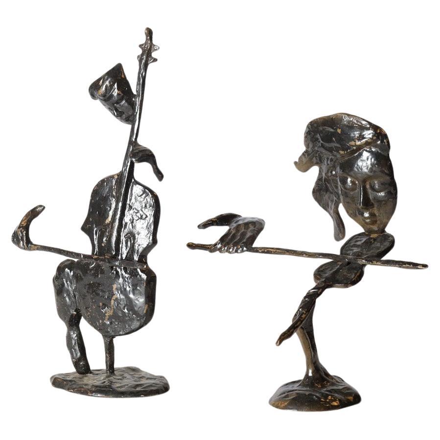Deux sculptures de musiciens décoratives anciennes pour la maison