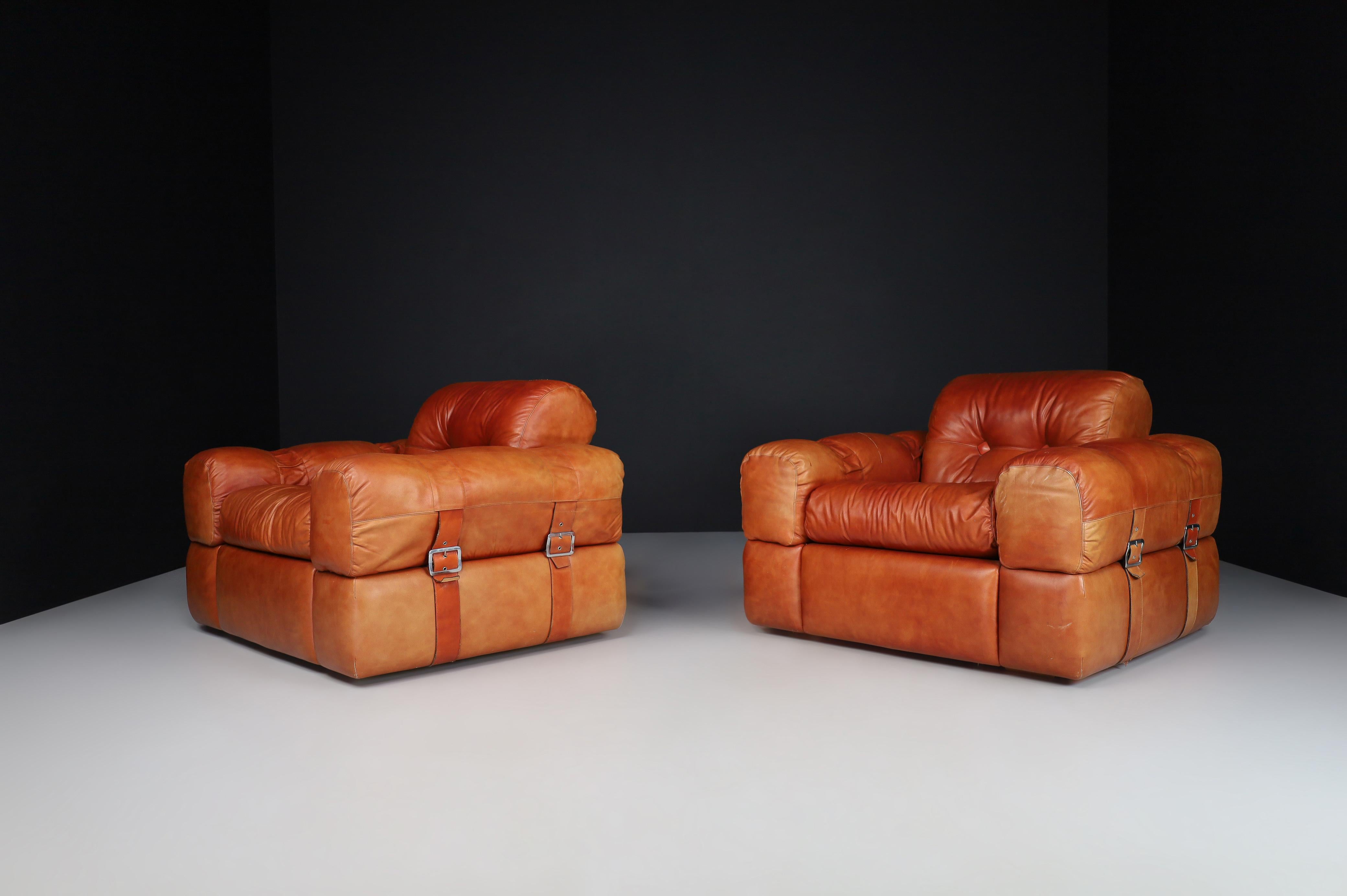 A couple of Lounge Chairs in Patinated Cognac Leather, Italy 1970   4