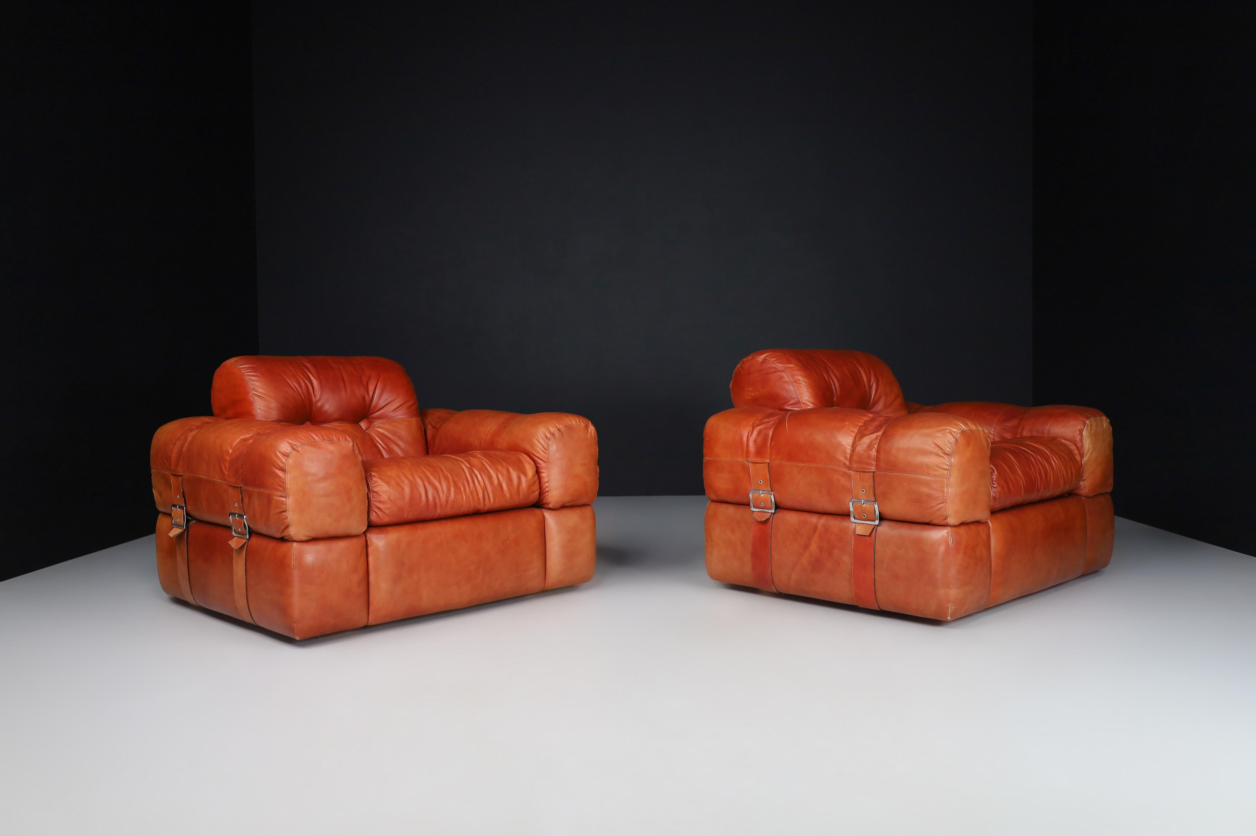 Italian A couple of Lounge Chairs in Patinated Cognac Leather, Italy 1970  