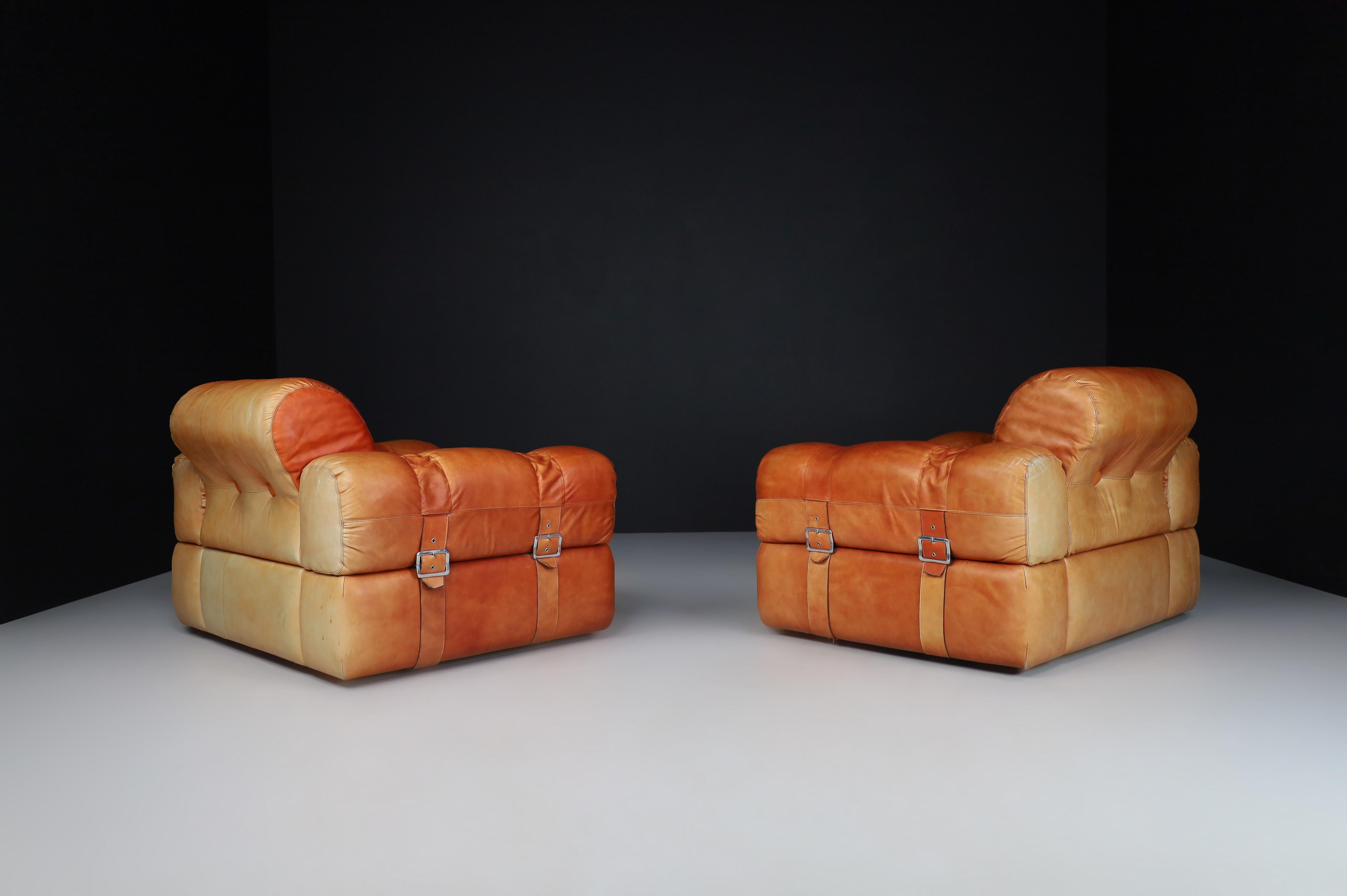 A couple of Lounge Chairs in Patinated Cognac Leather, Italy 1970   In Good Condition In Almelo, NL