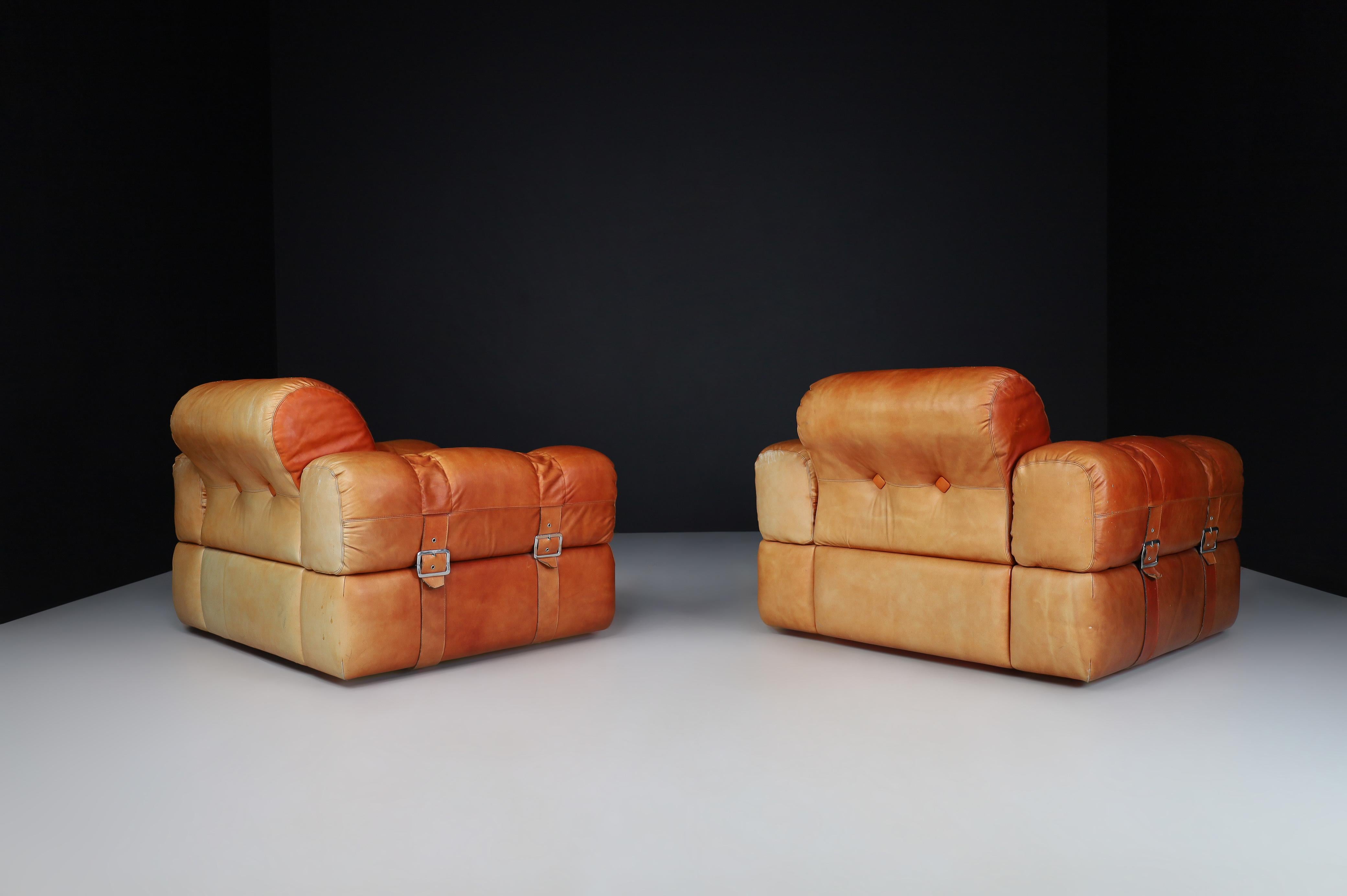 A couple of Lounge Chairs in Patinated Cognac Leather, Italy 1970   2