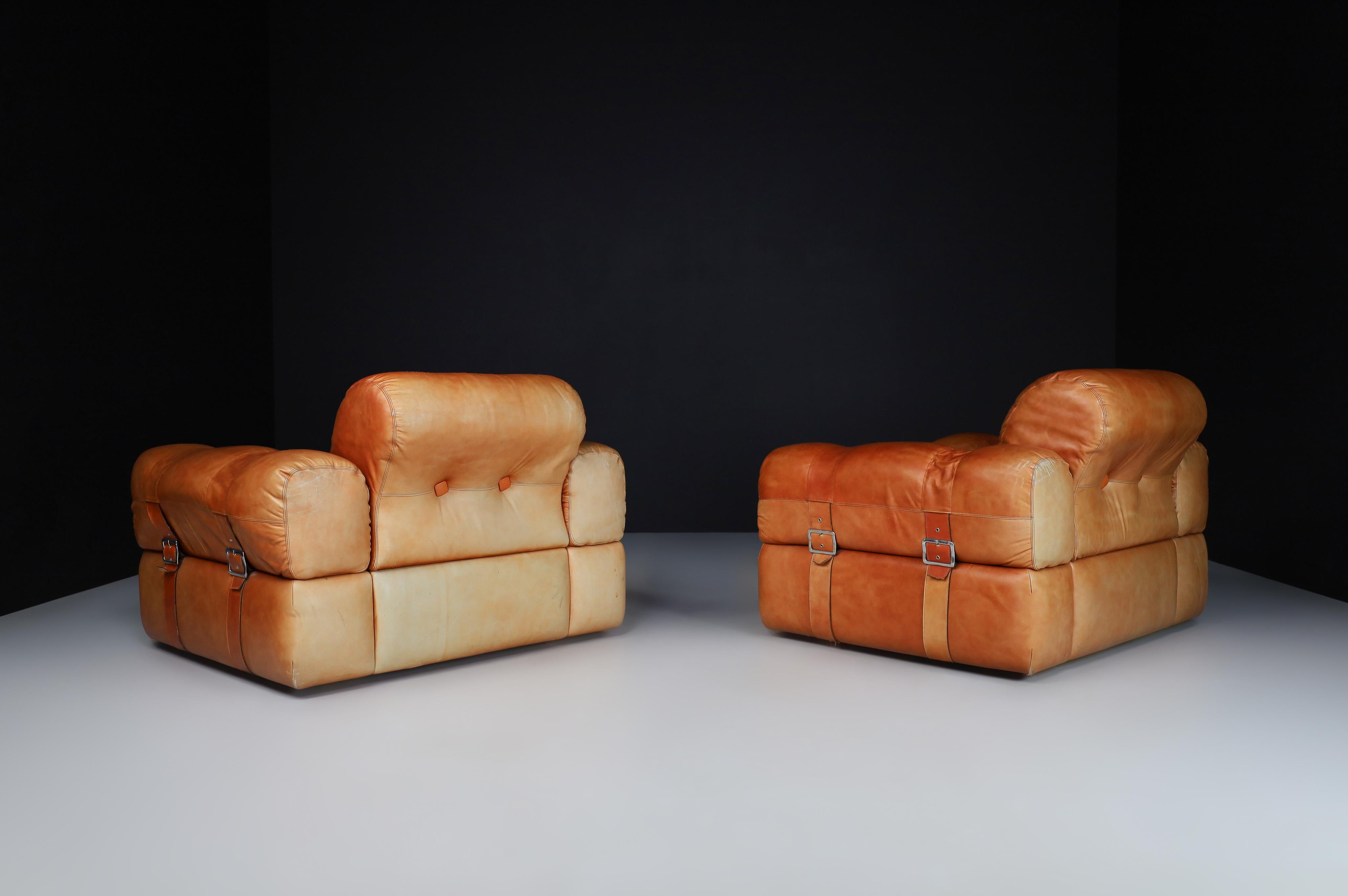 A couple of Lounge Chairs in Patinated Cognac Leather, Italy 1970   3