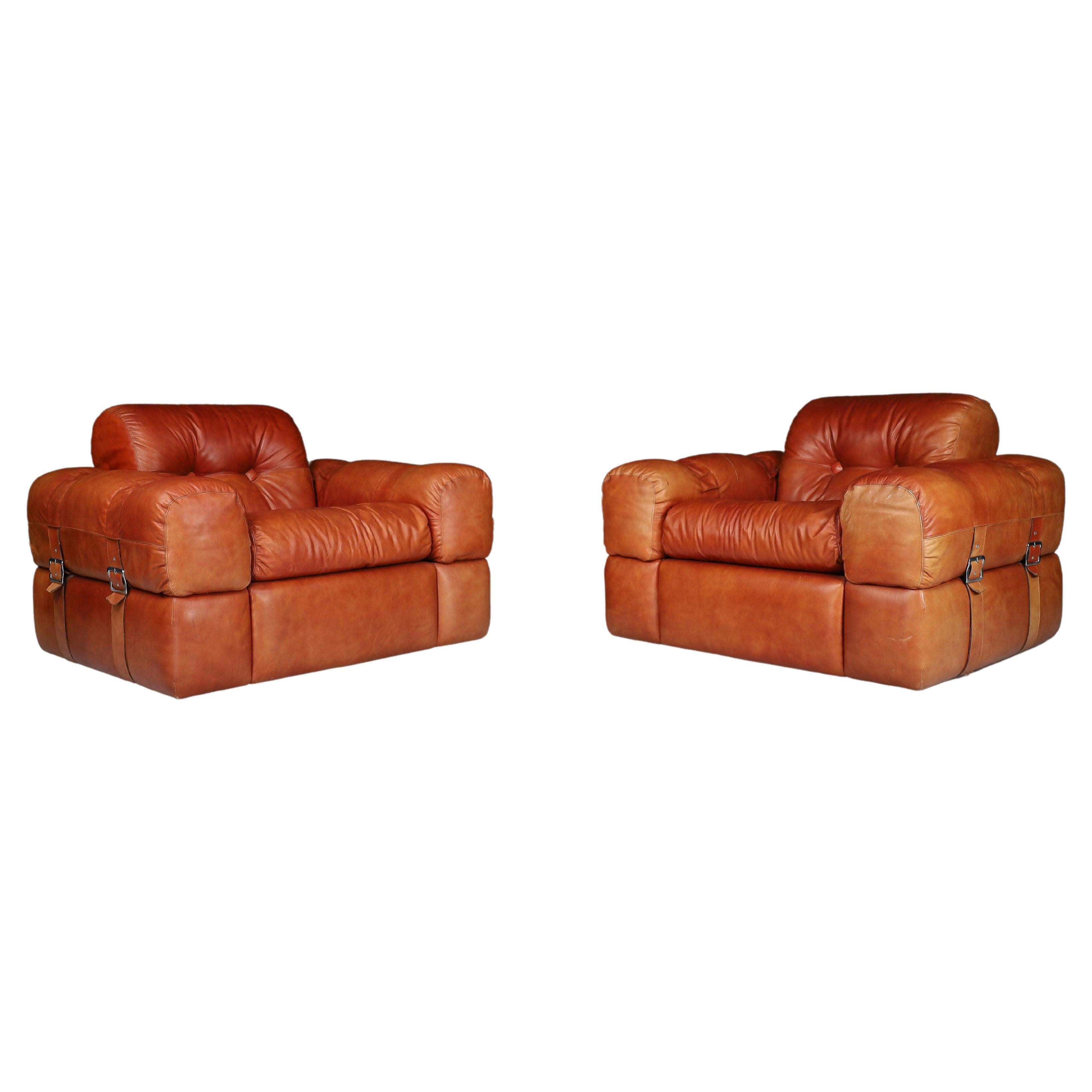 A couple of Lounge Chairs in Patinated Cognac Leather, Italy 1970  