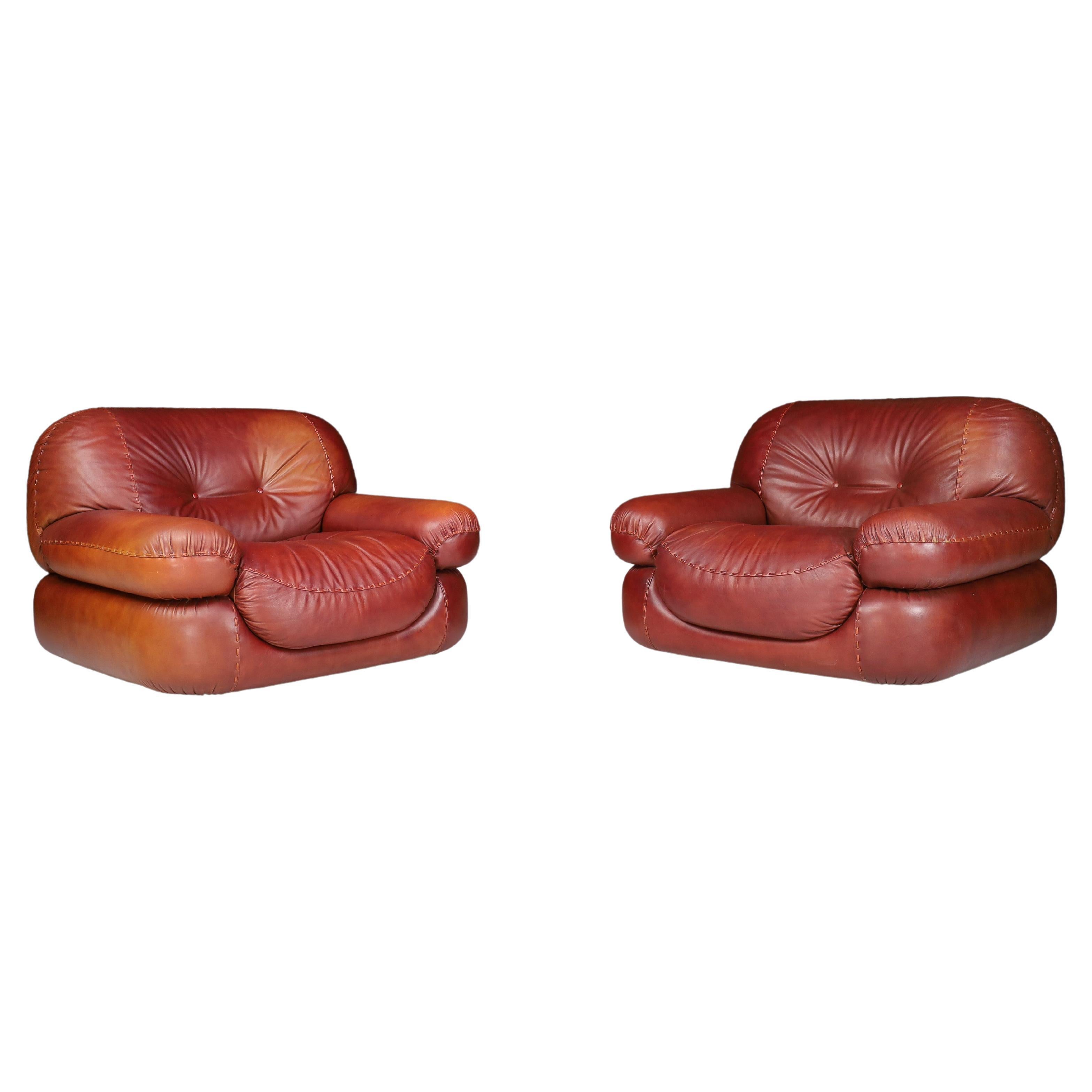A couple of Lounge Chairs in Patinated CognacLeather by Sapporo for Mobil Girgi