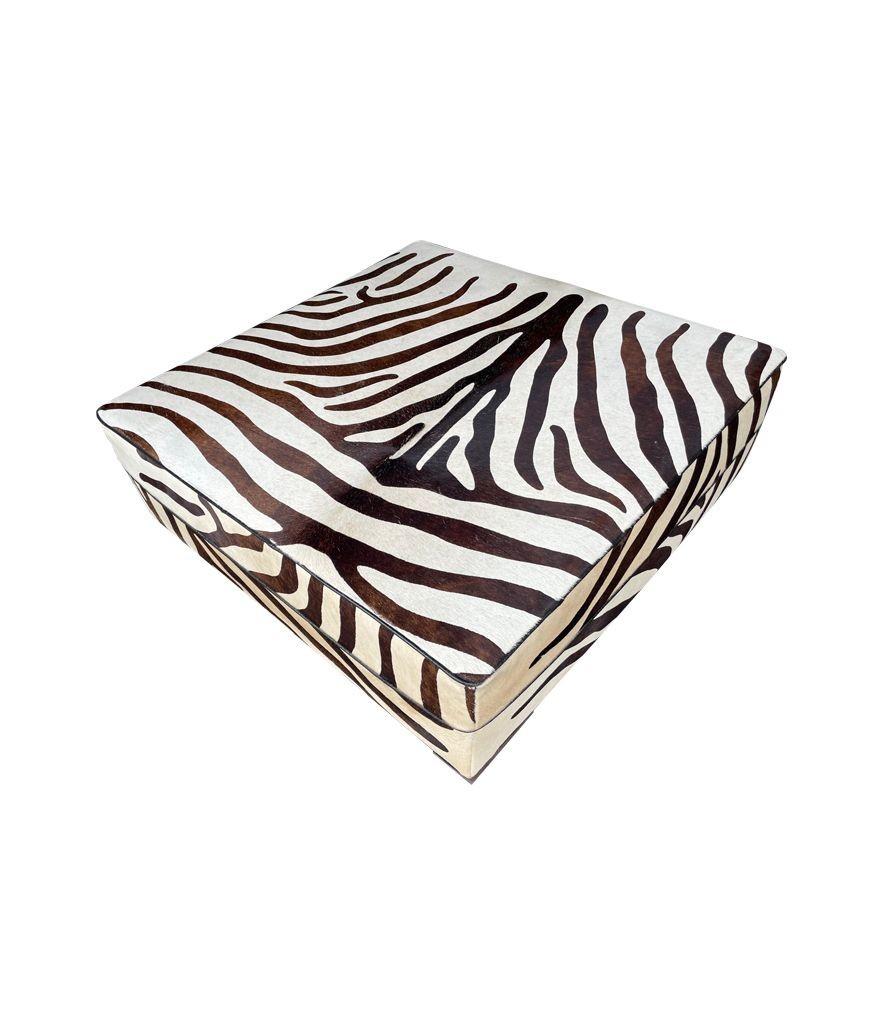 Cowhide Covered Ottoman with Printed Zebra Skin Design 6