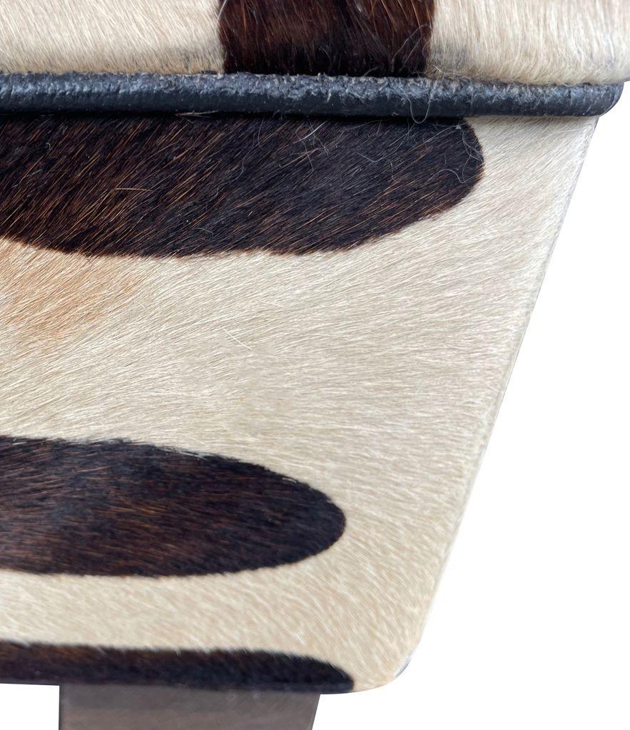Cowhide Covered Ottoman with Printed Zebra Skin Design 8