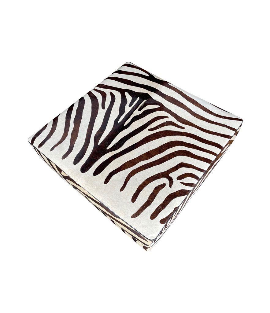 Contemporary Cowhide Covered Ottoman with Printed Zebra Skin Design