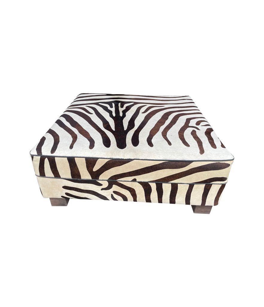 Cowhide Covered Ottoman with Printed Zebra Skin Design 3