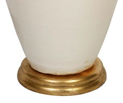 A Cream Color Ceramic Lamp on Giltwood Base with Linen Shade