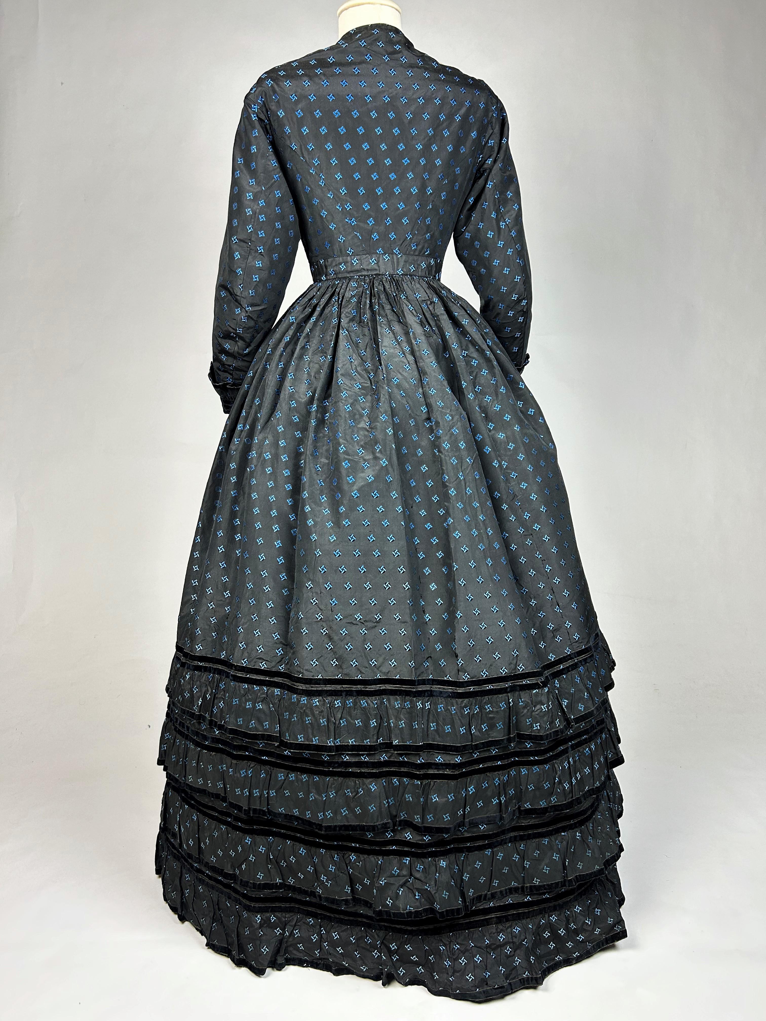 A Crinoline Day dress in black taffeta brocaded silk brocaded France Circa 1870 8