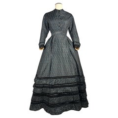A Crinoline Day dress in black taffeta brocaded silk brocaded France Circa 1870