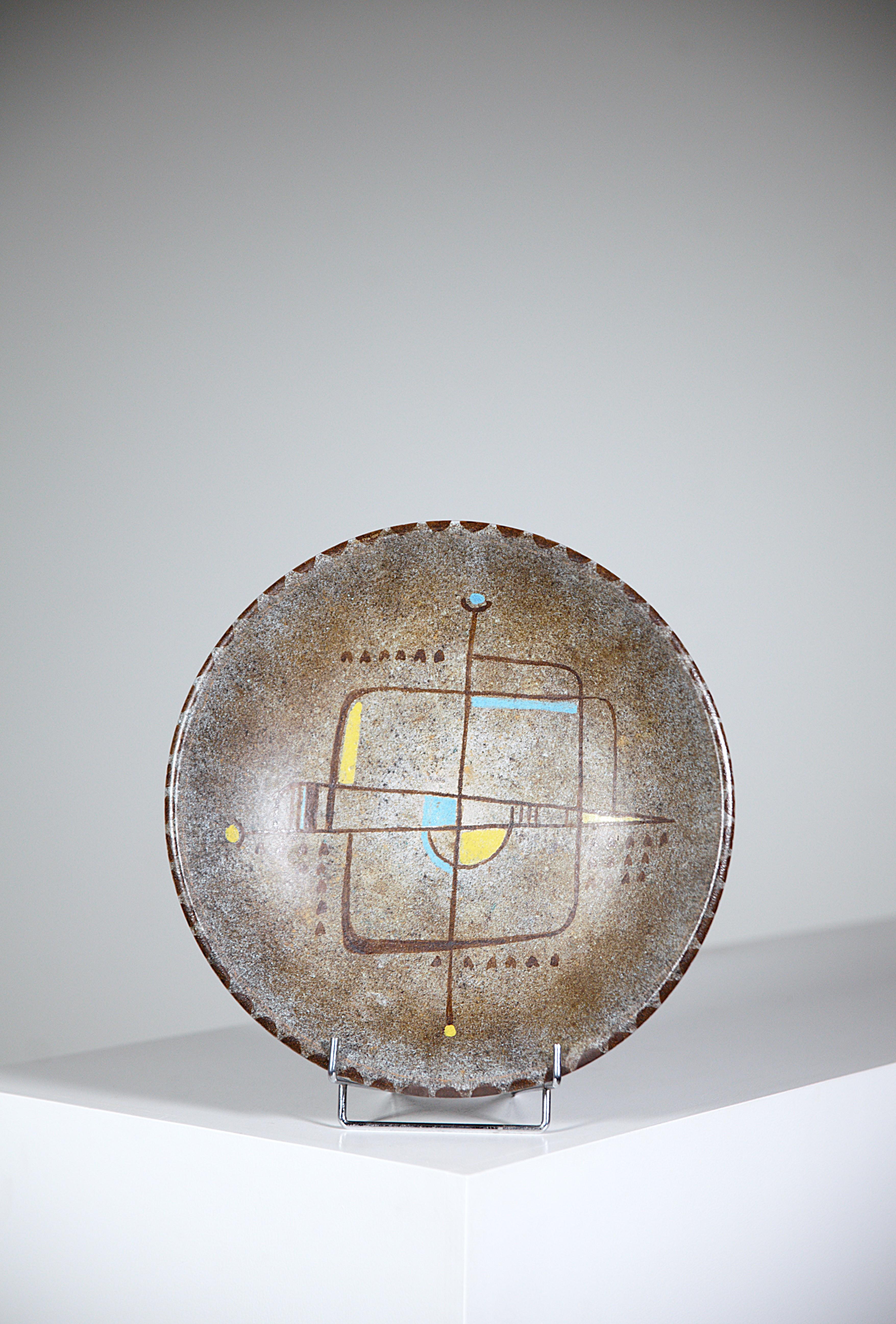 A Cubic Ceramic Plate by La Grange aux Potiers.

With cubic decorations. Can be appreciated as a painting.

Signed 