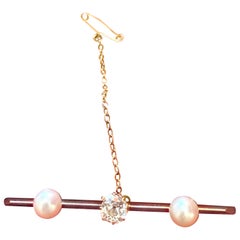 A Cultured Pearl and Diamond Bar Brooch