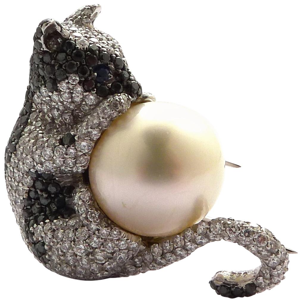 Cultured Pearl, Diamond and Black Diamond Kitten Mounted in 18 Karat White Gold For Sale