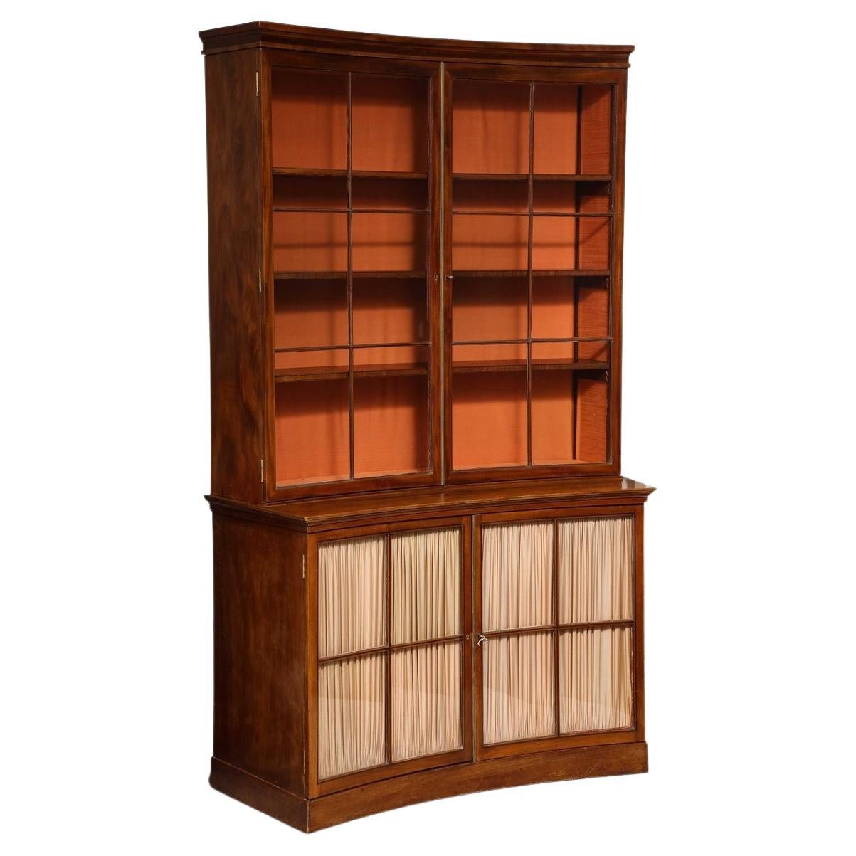 A Curved French Walnut Bibliothèque (One of Two) For Sale