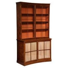 A Curved French Walnut Bibliothèque (One of Two)