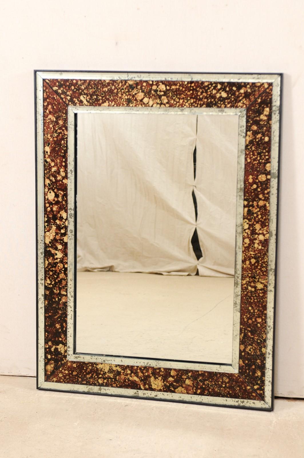North American An Artisan Created Rectangular Mirror with Églomisé Tortoise Surround, 60