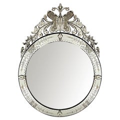 A Custom Venetian Style Circular Mirror with Ornate Butterfly & Floral Crest 