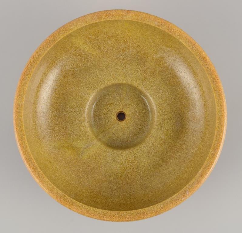 Modern A. D. Copier, Dutch ceramicist. Ceramic flower pot. Glaze in yellow-green tones.