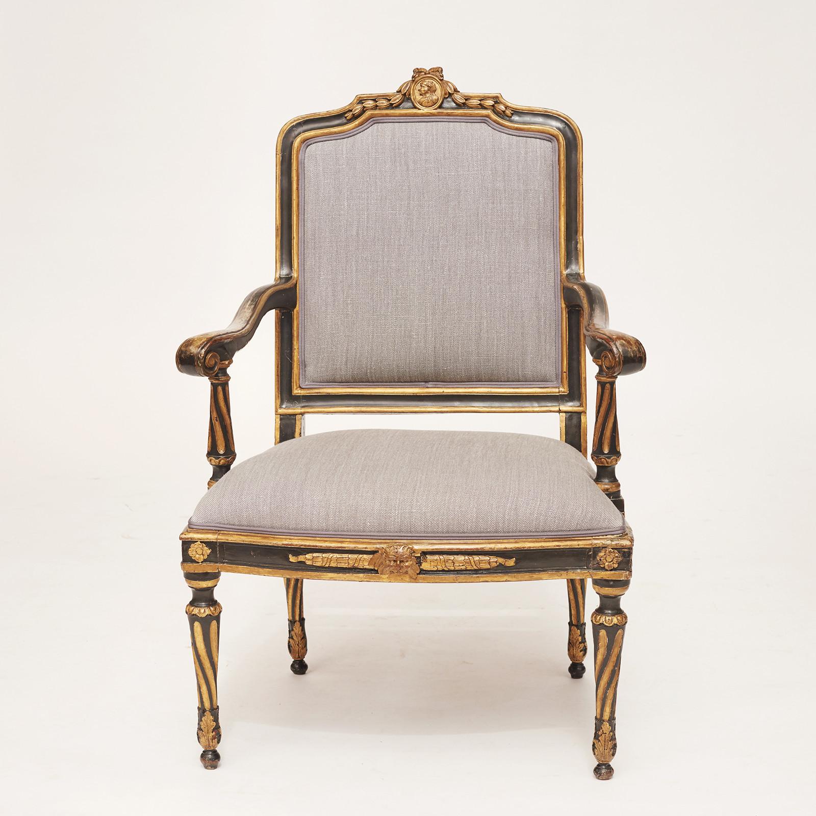 A Danish Louis XVI painted and parcel-gilt Fauteuil a La Reine, approximate 1780s. Classic form with interesting twist carved fluting to the arm supports and legs. New linen fabric by Colefax & Fowler.