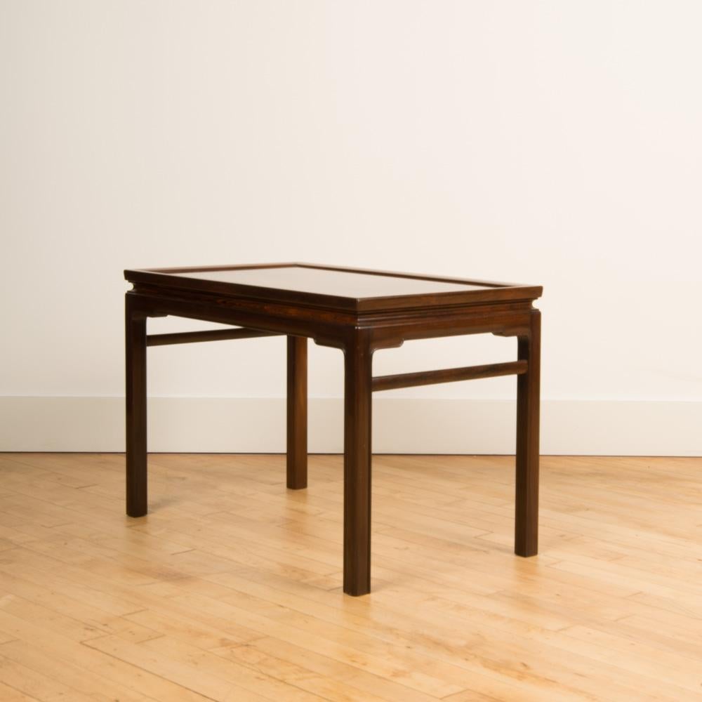 A beautiful Danish end table, by Lysberg, Hansen and Therp, rosewood, circa 1950. This table has been French polished to perfection.
