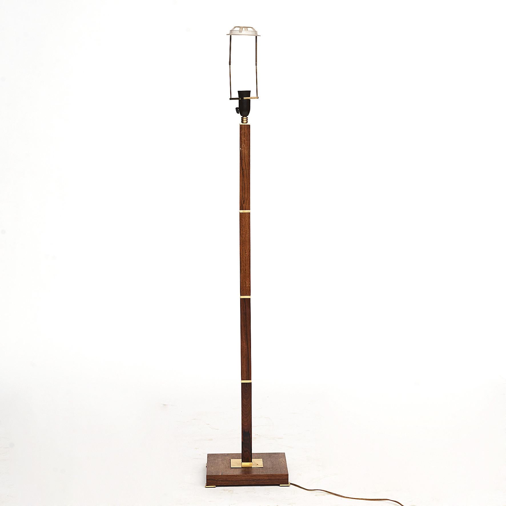 Rosewood and brass banded floor lamp by Fog & Mørup
Designed and produced in Denmark, circa 1955.
Height to top of pole: 110.5 cm.
Lampshade included.