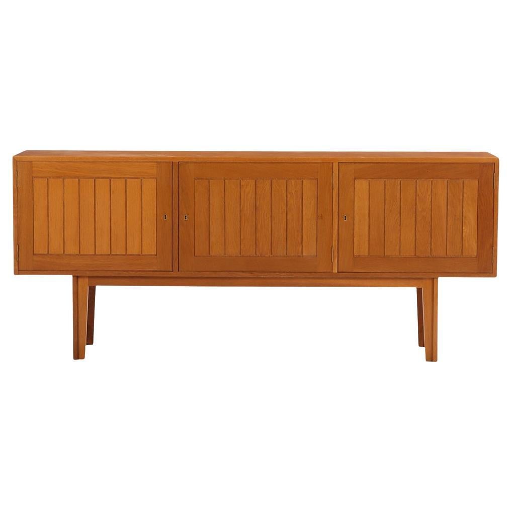 A Danish Oak Cabinet / Sideboard, C. 1950.
