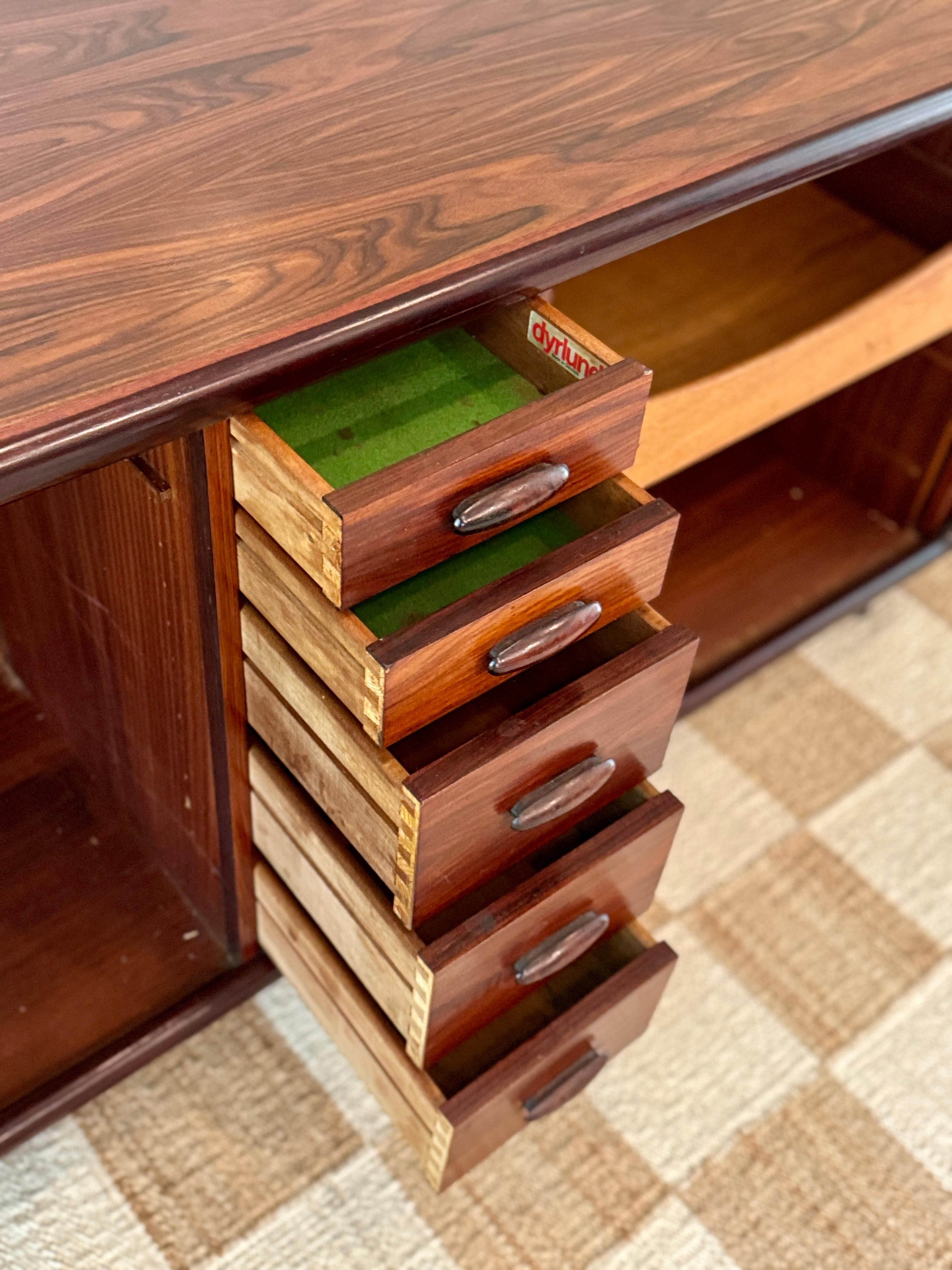 Mid-20th Century A Danish tambour door credenza made of Brazilian Rosewood by Dyrlund, circa 1960 For Sale