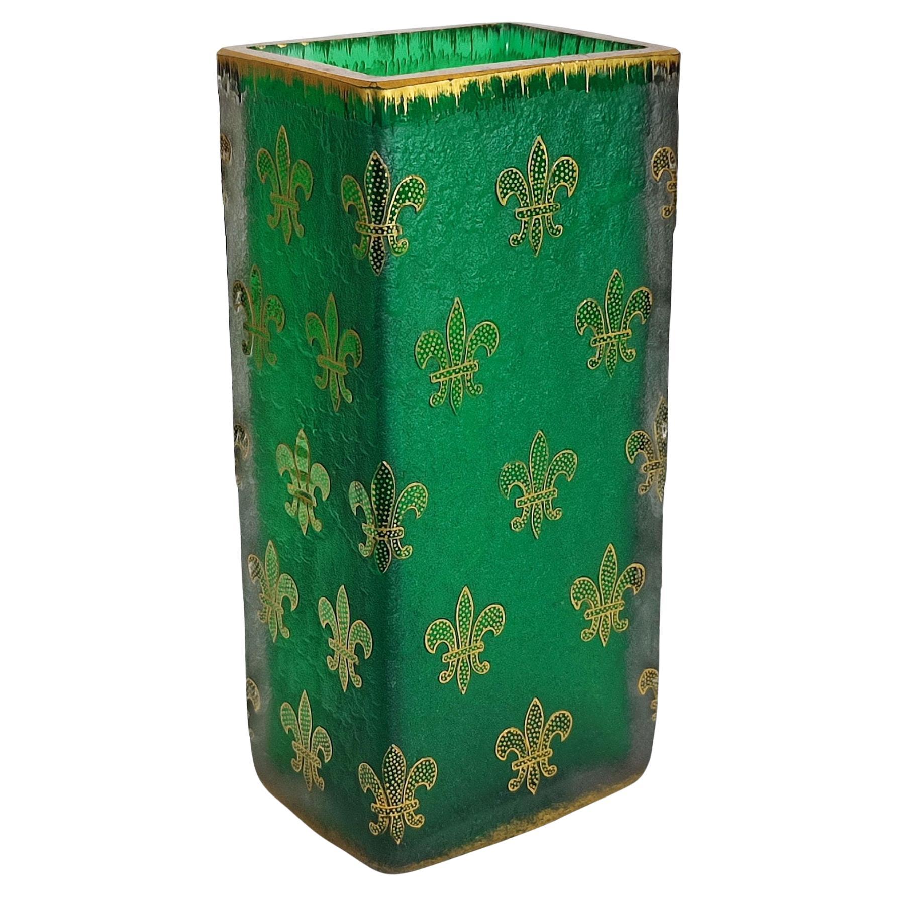 A miniature french gilt and enameled green cameo glass vase, 
signed in gilt 